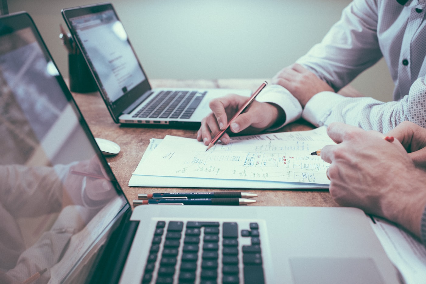 Consultant working through a technology plan with a client